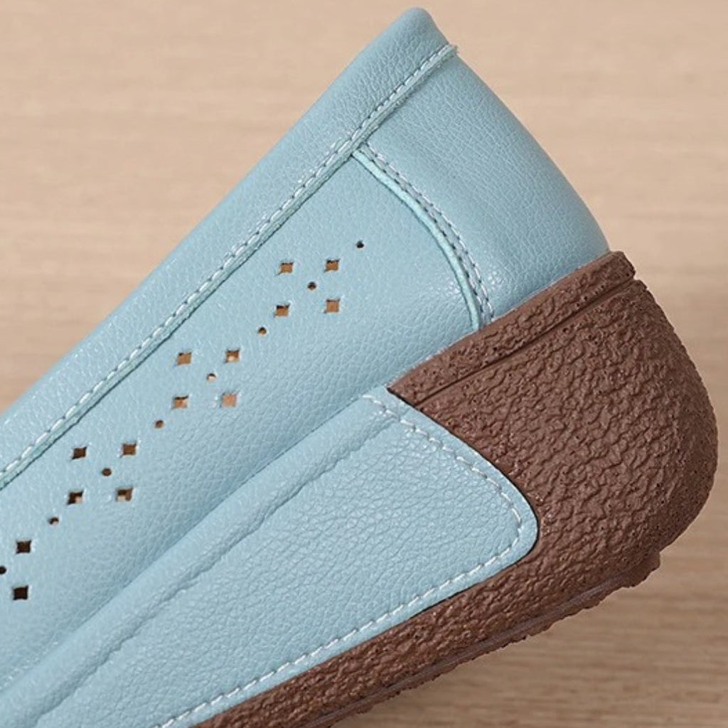 Women's perforated leather wedge loafers