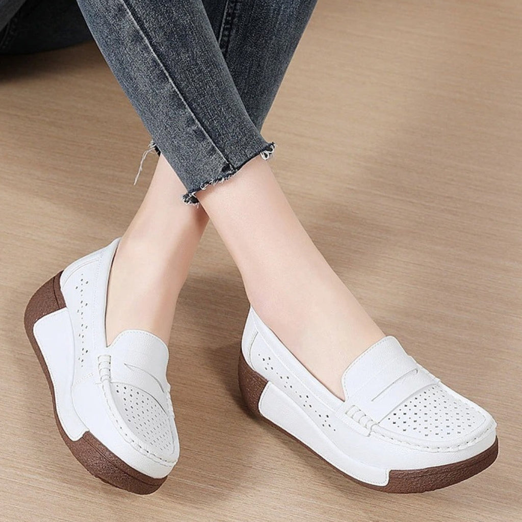 Women's perforated leather wedge loafers
