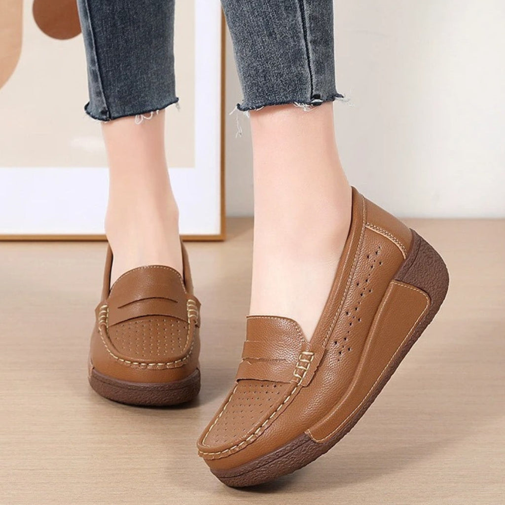 Women's perforated leather wedge loafers