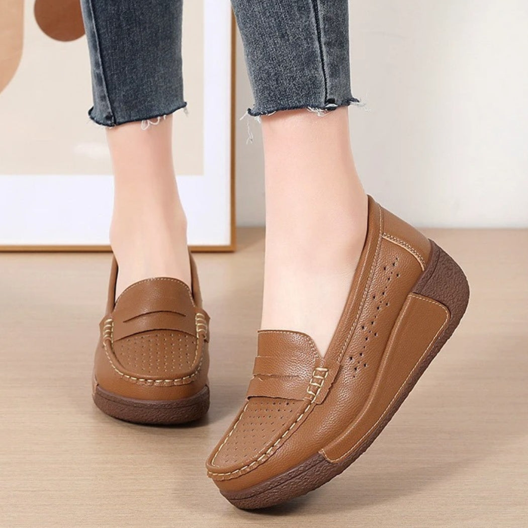 Women's perforated leather wedge loafers