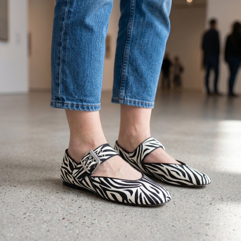 Women's rubber animal print loafer flats with maxi buckle
