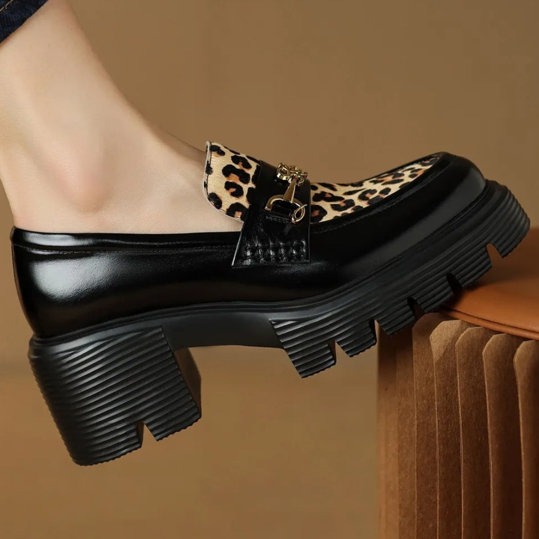 Women's black leather loafers with leopard print and heels