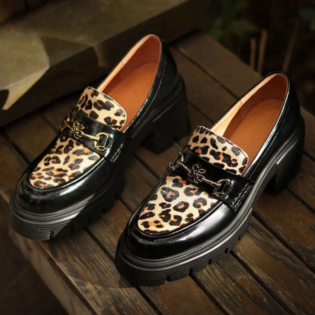 Women's black leather loafers with leopard print and heels