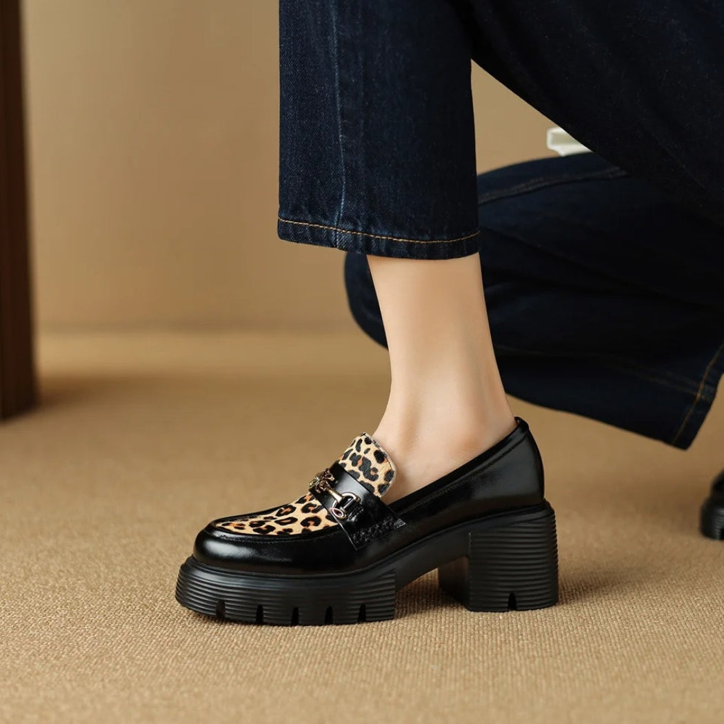 Women's black leather loafers with leopard print and heels