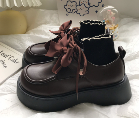 Faux leather loafers with bow tie and thick sole