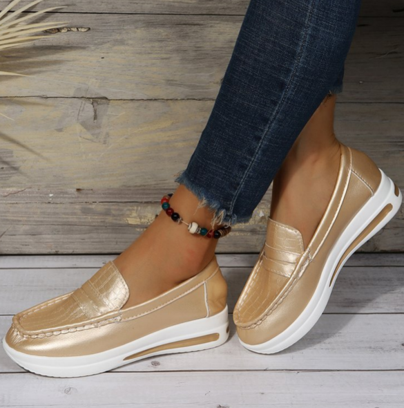 Sneaker-style wedge loafers with shiny details
