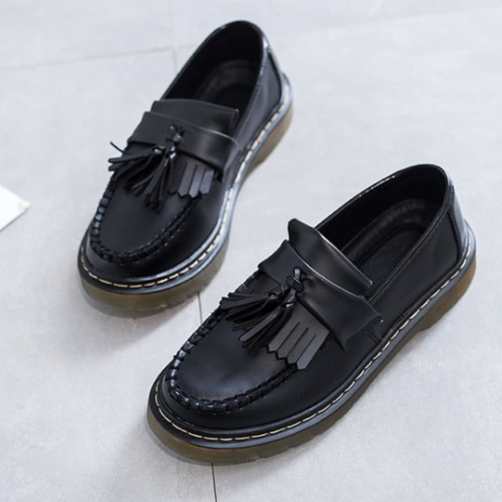 Women's synthetic leather tassel and fringe loafers