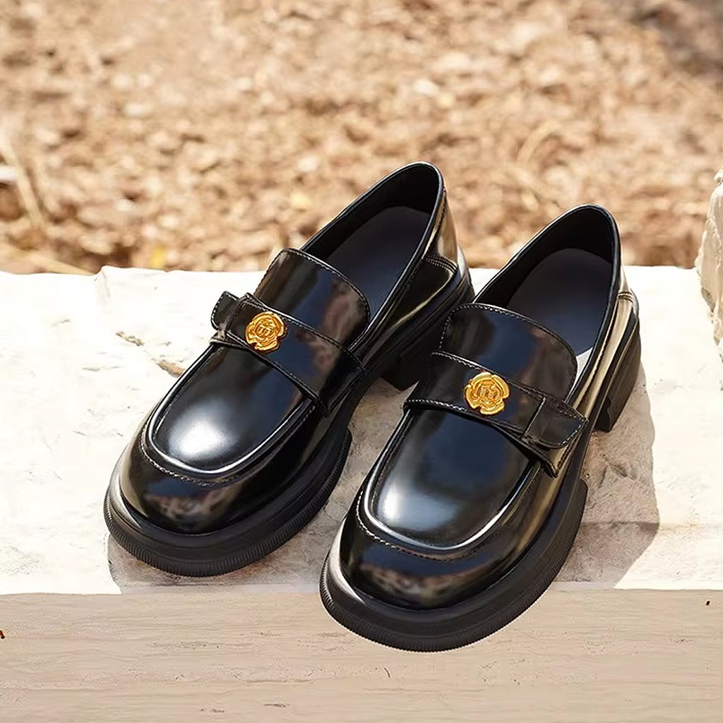 Platform loafers with flower details