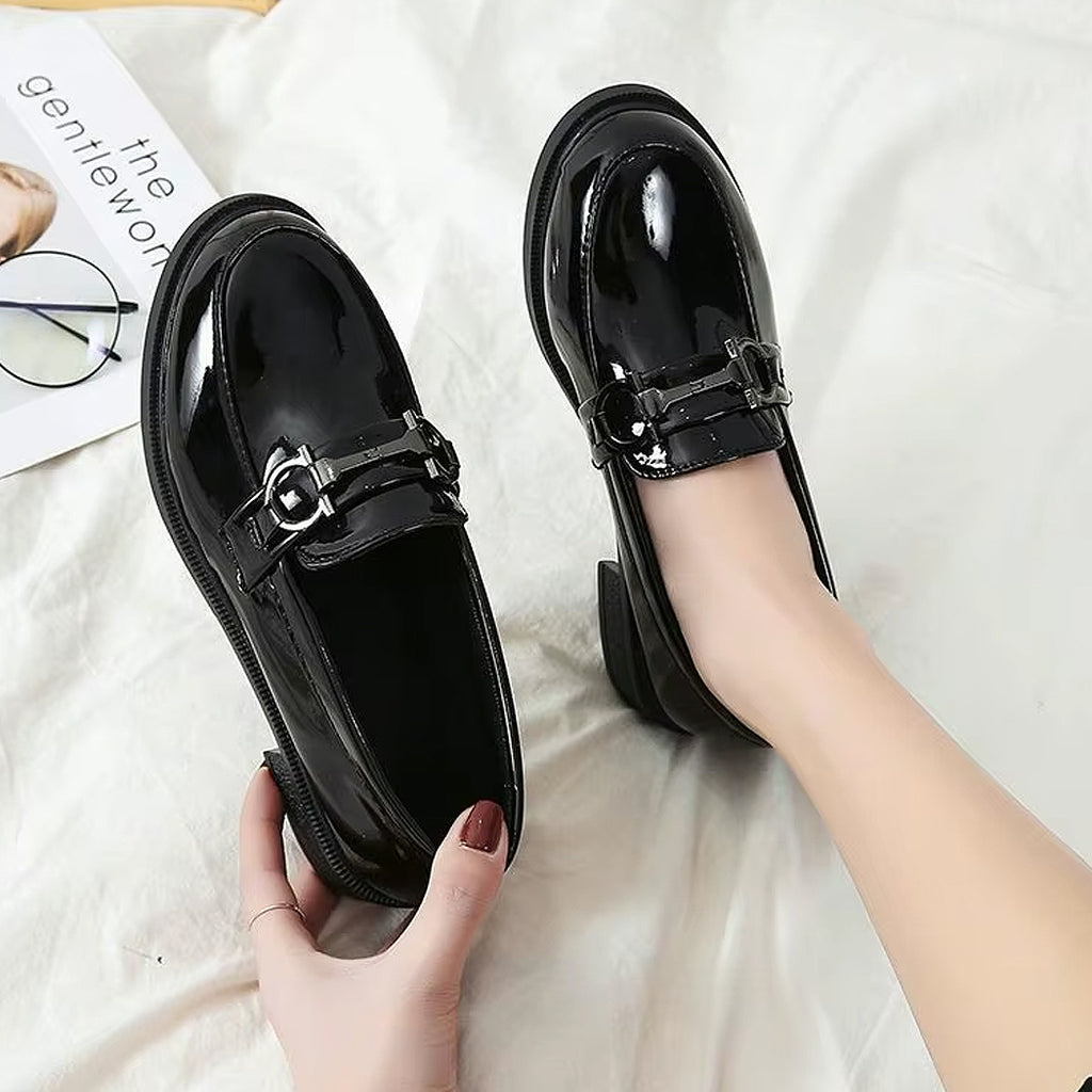 Loafers in faux patent leather with metallic details