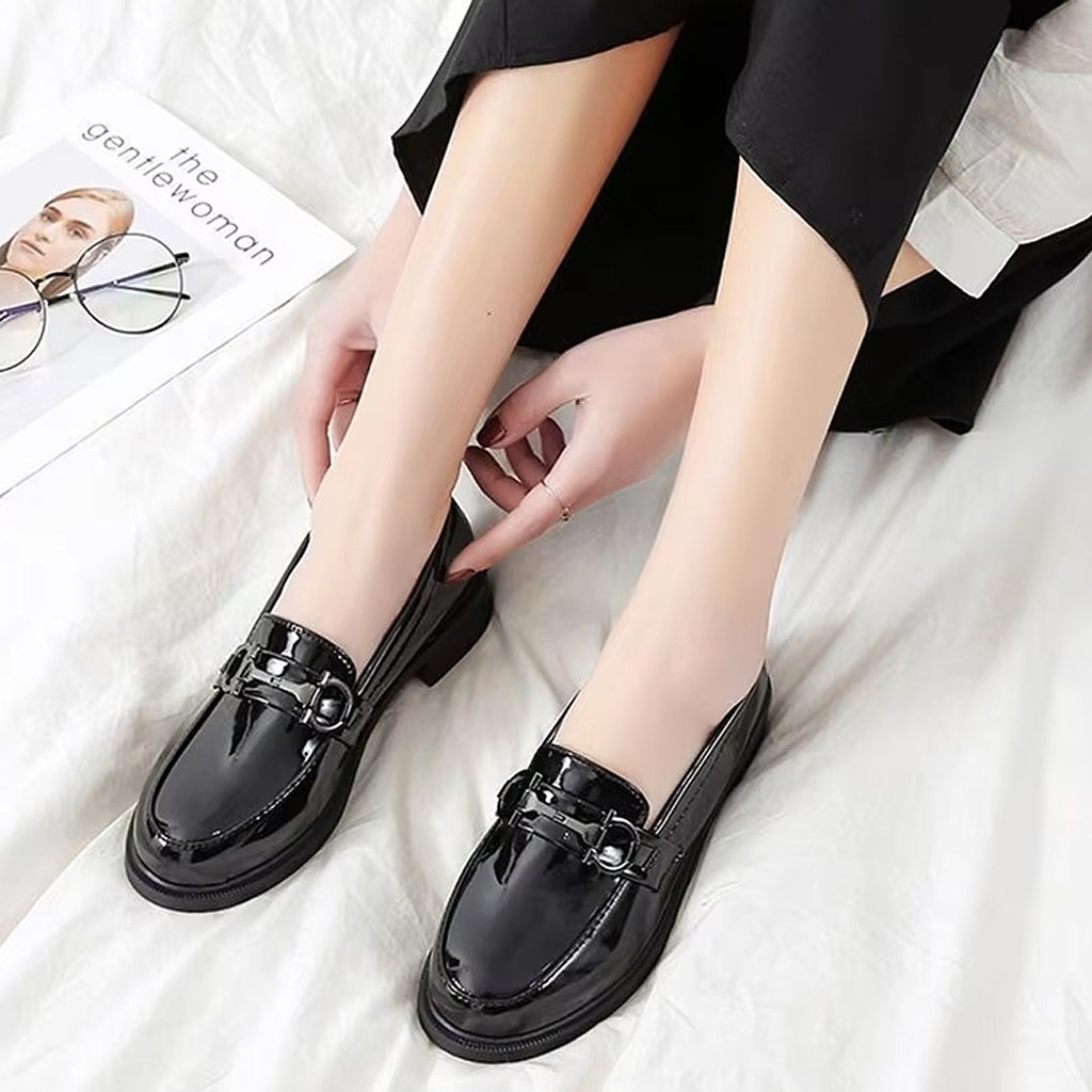 Loafers in faux patent leather with metallic details