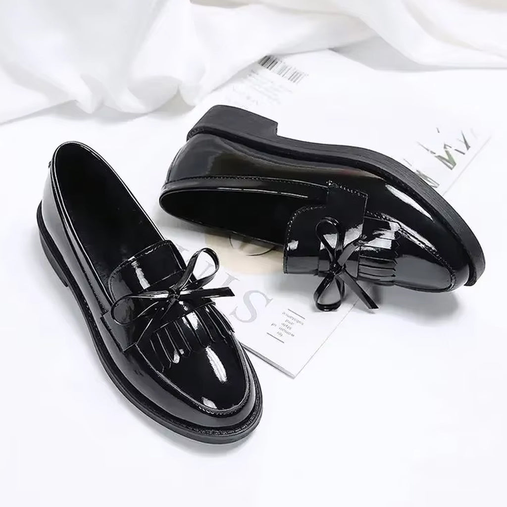 Patent loafers with fringe and bow