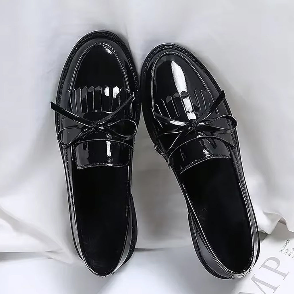 Patent loafers with fringe and bow