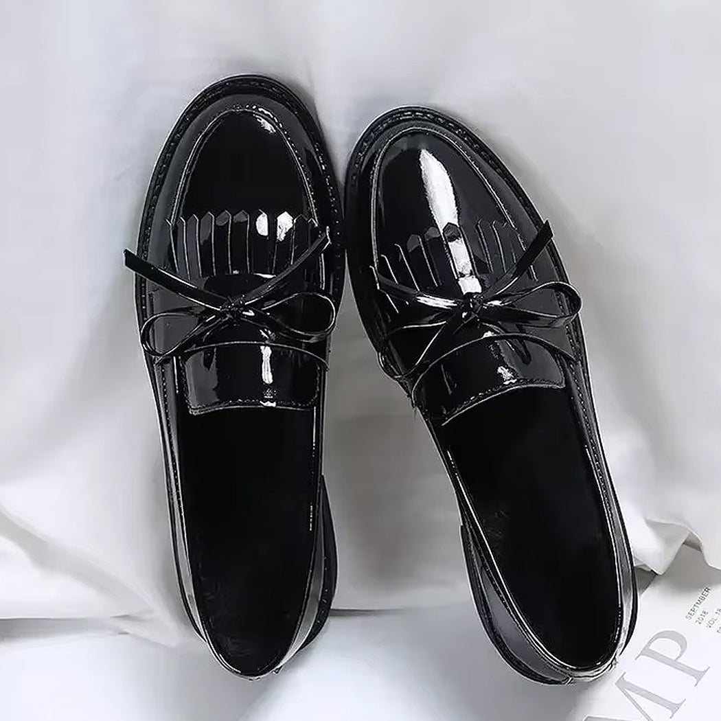 Patent loafers with fringe and bow