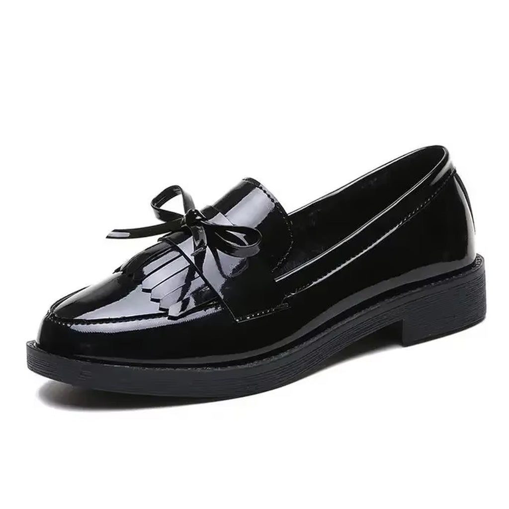 Patent loafers with fringe and bow