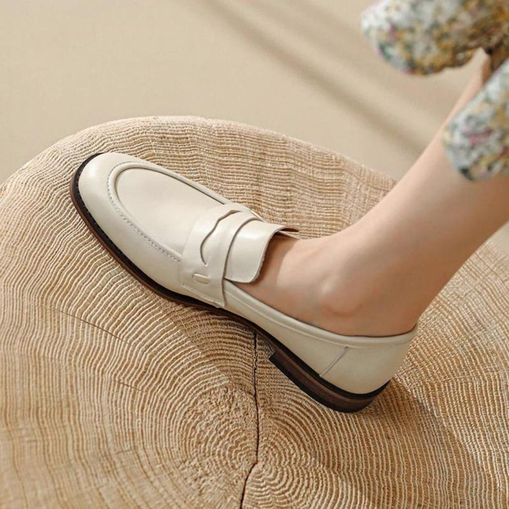Women's beige genuine leather loafers with brown soles