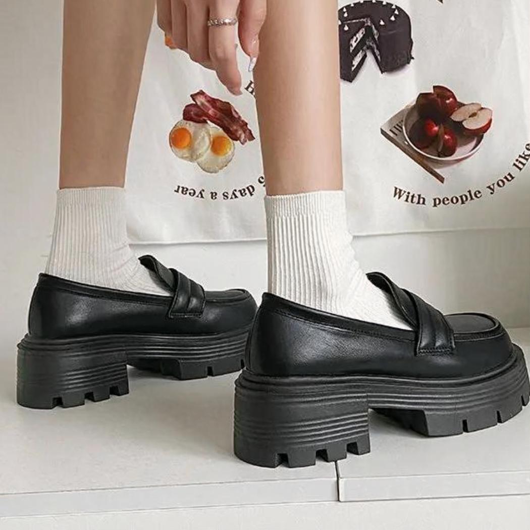Women's platform loafers in white or black synthetic leather