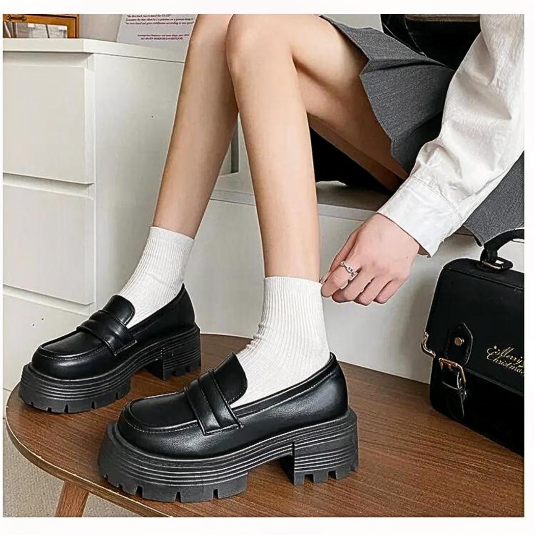 Women's platform loafers in white or black synthetic leather