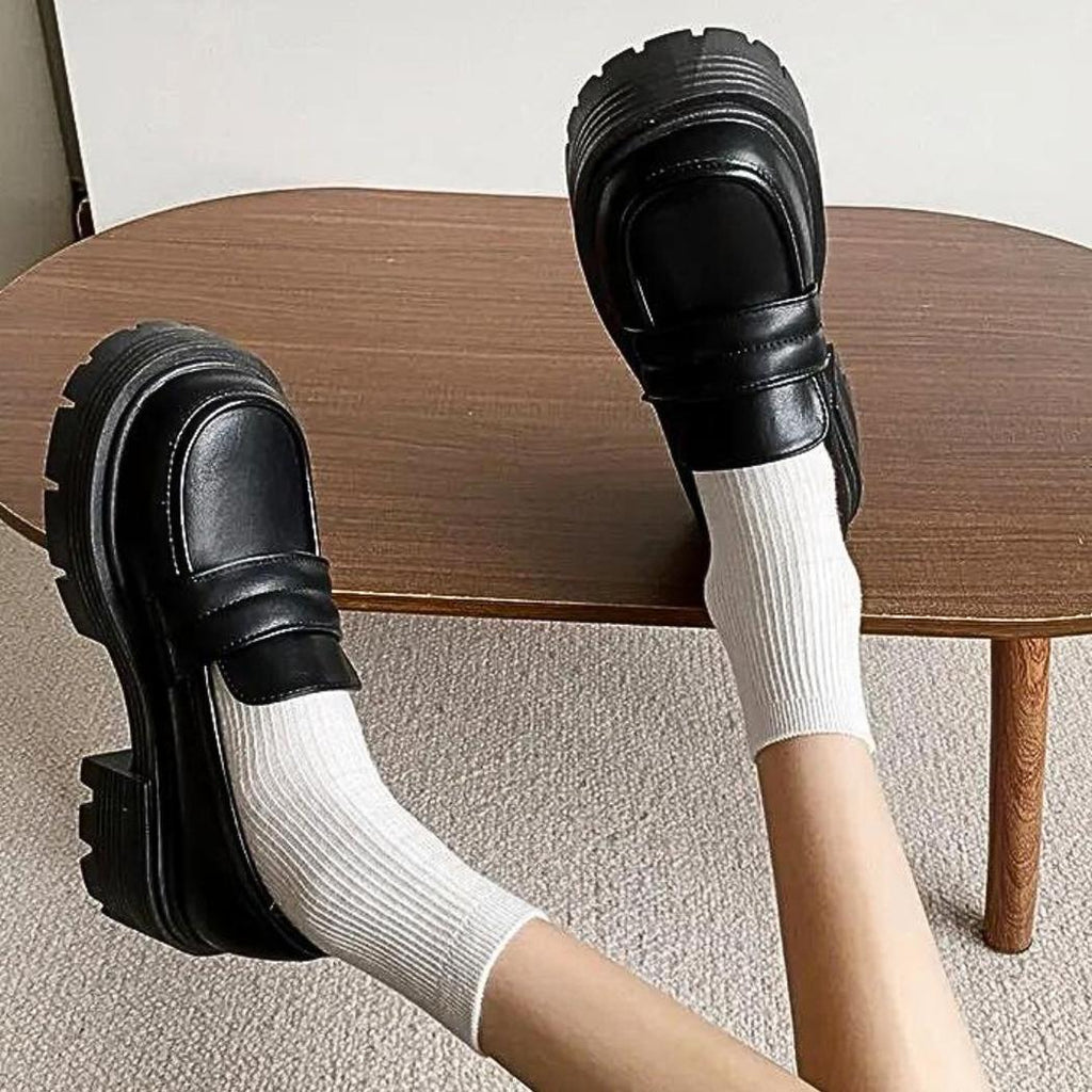 Women's platform loafers in white or black synthetic leather