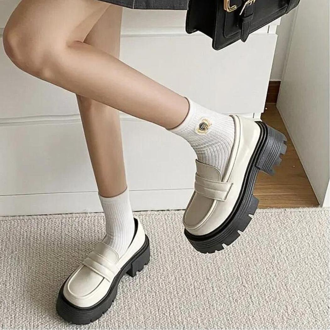 Women's platform loafers in white or black synthetic leather