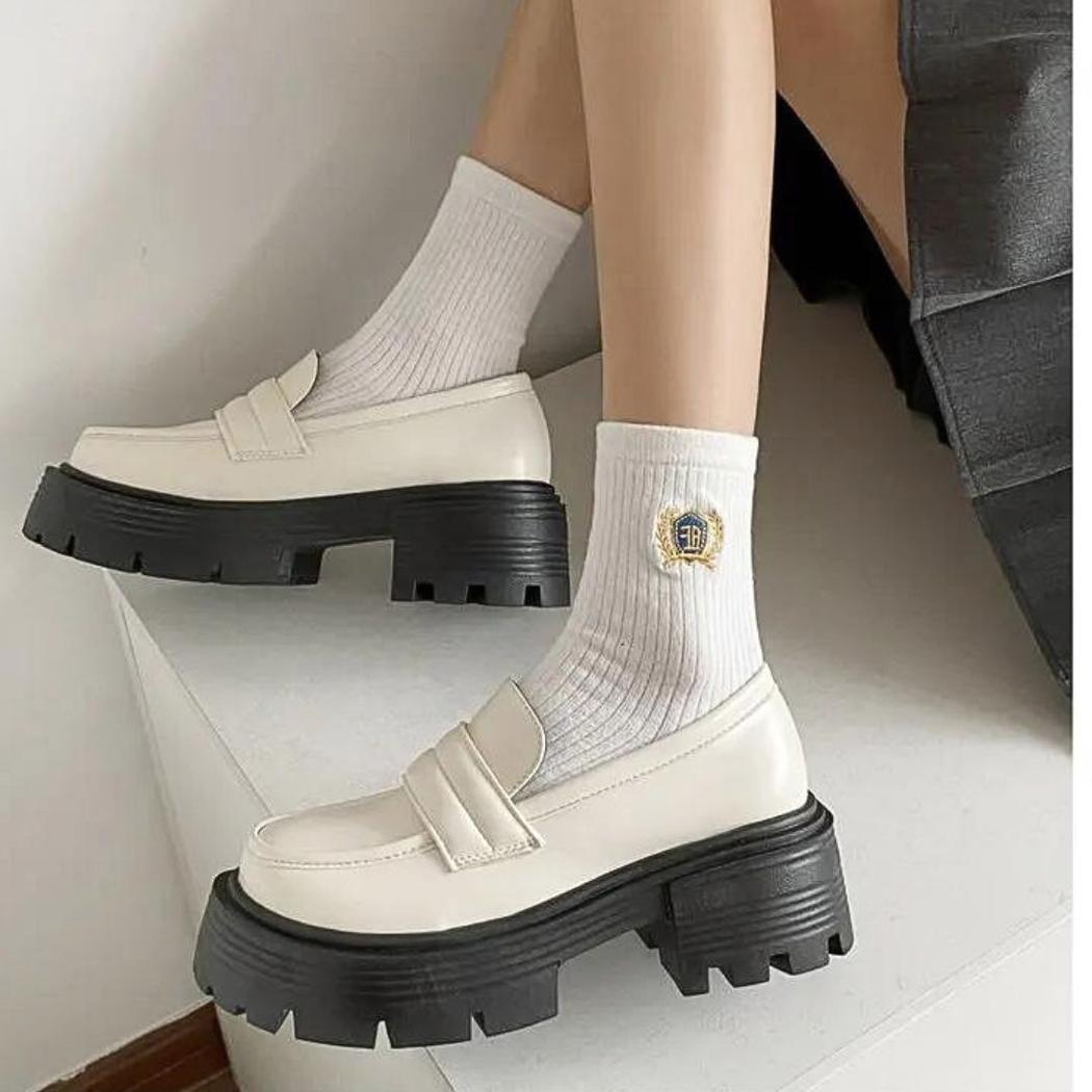 Women's platform loafers in white or black synthetic leather