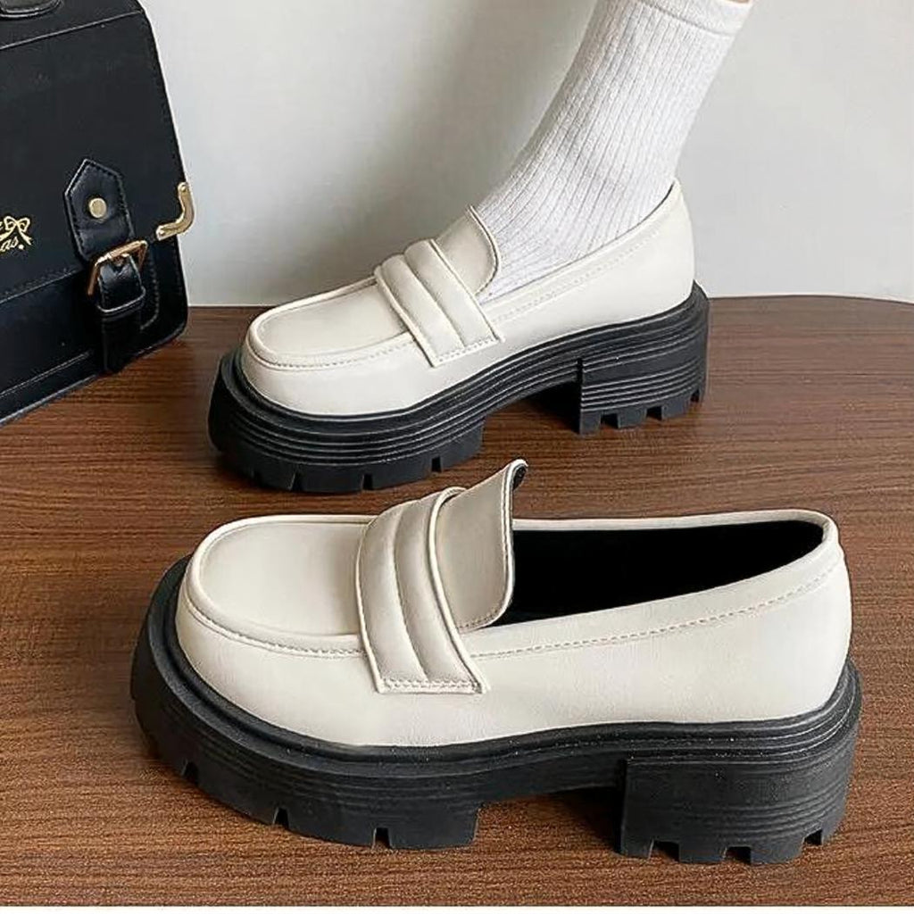 Women's platform loafers in white or black synthetic leather