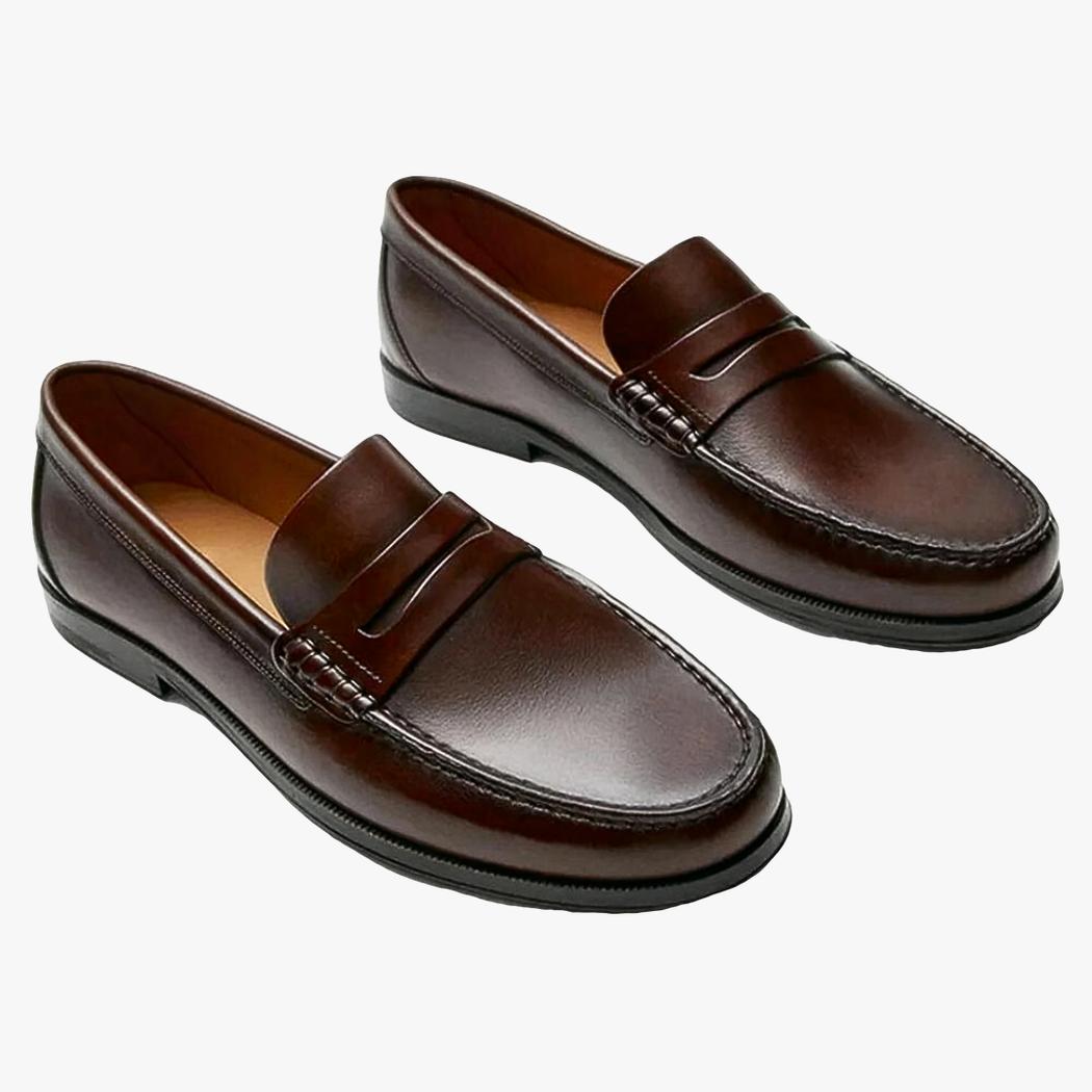 a pair of casual brown genuine leather loafers for men on a white background