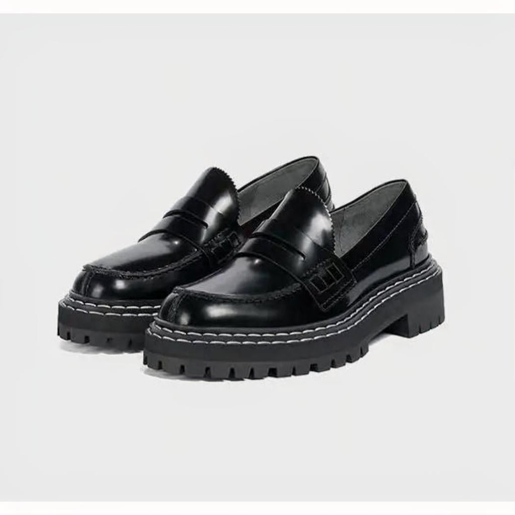 Women's black faux leather loafers with chunky soles