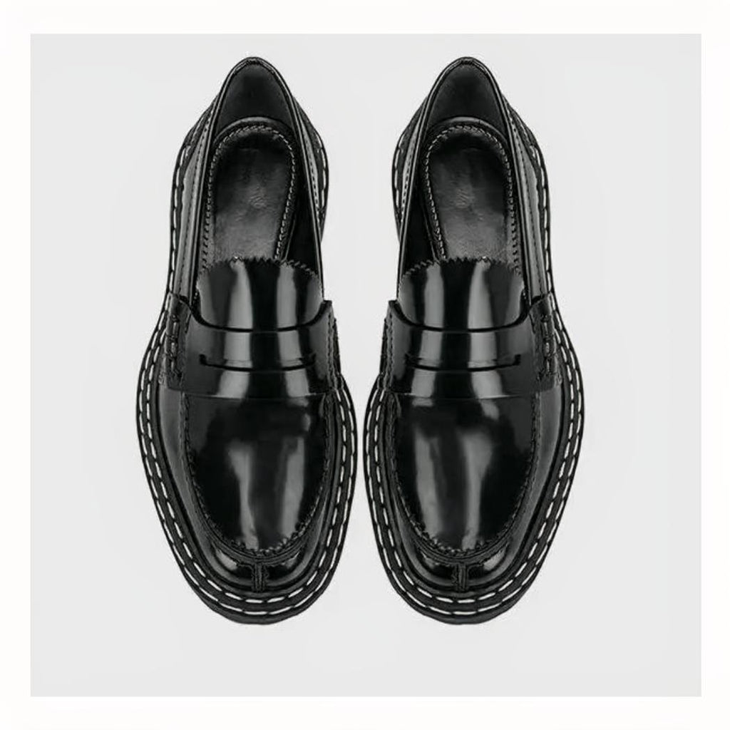 Women's black faux leather loafers with chunky soles