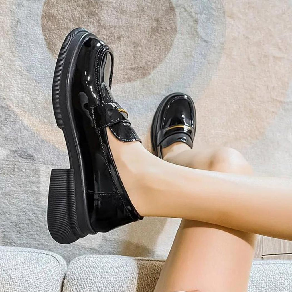 Women's black patent synthetic leather loafers
