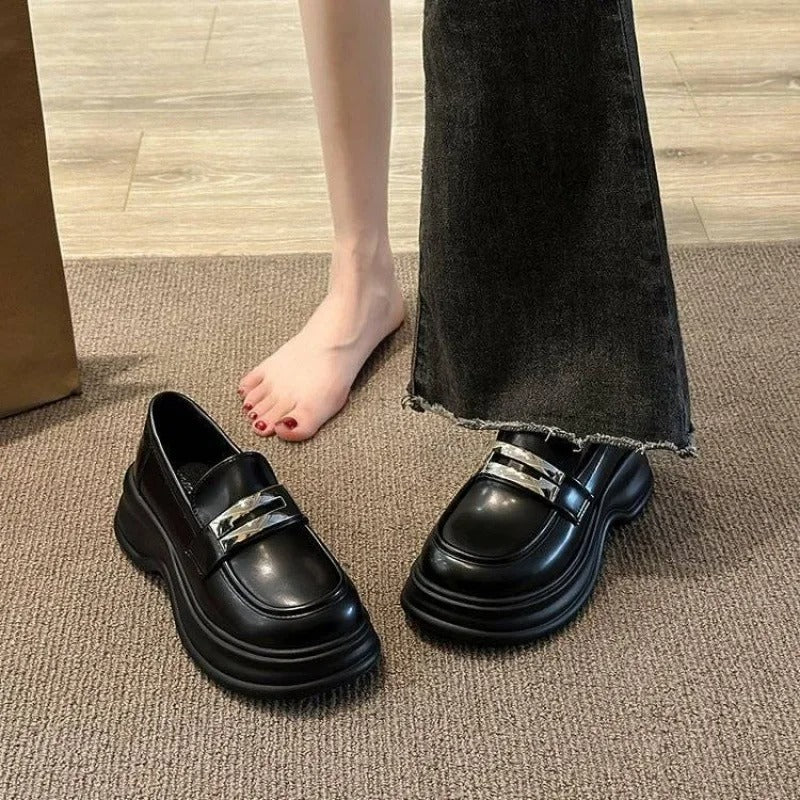 Women's platform loafers with a silver strap