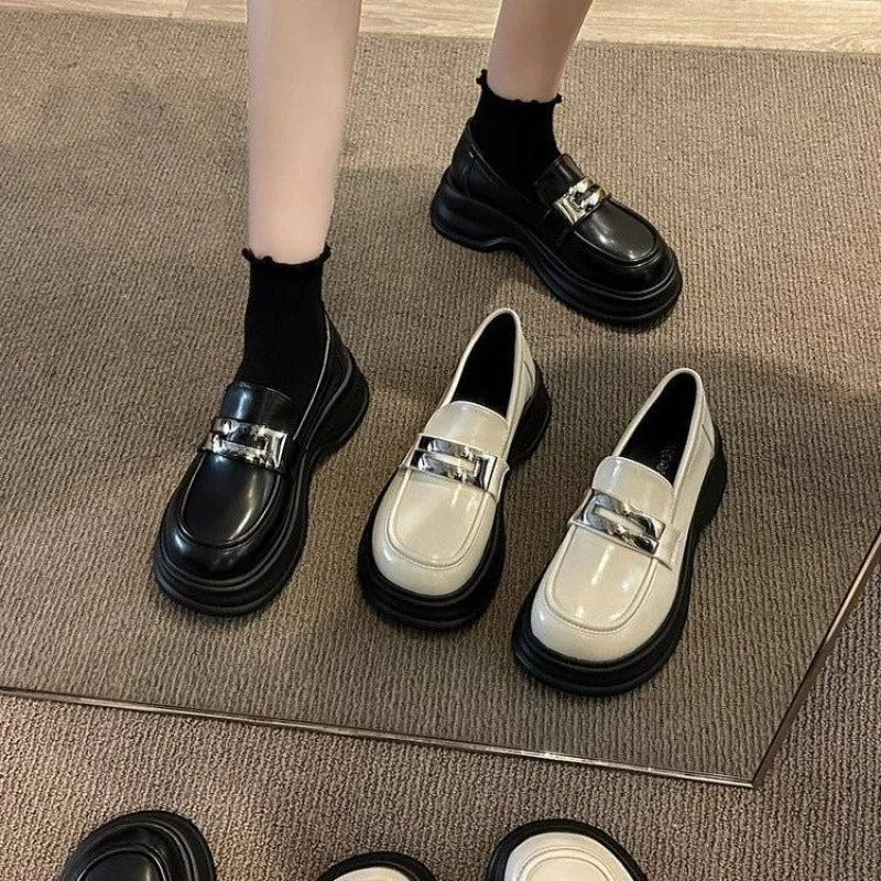 Women's platform loafers with a silver strap