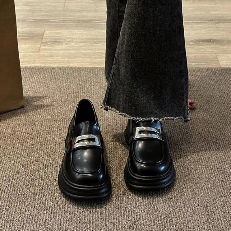 Women's platform loafers with a silver strap