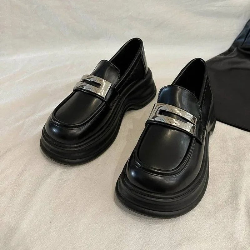Women's platform loafers with a silver strap