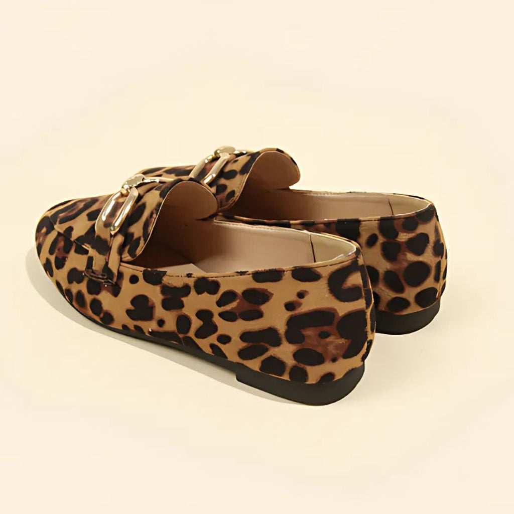 British-style loafers with leopard print and gold buckles