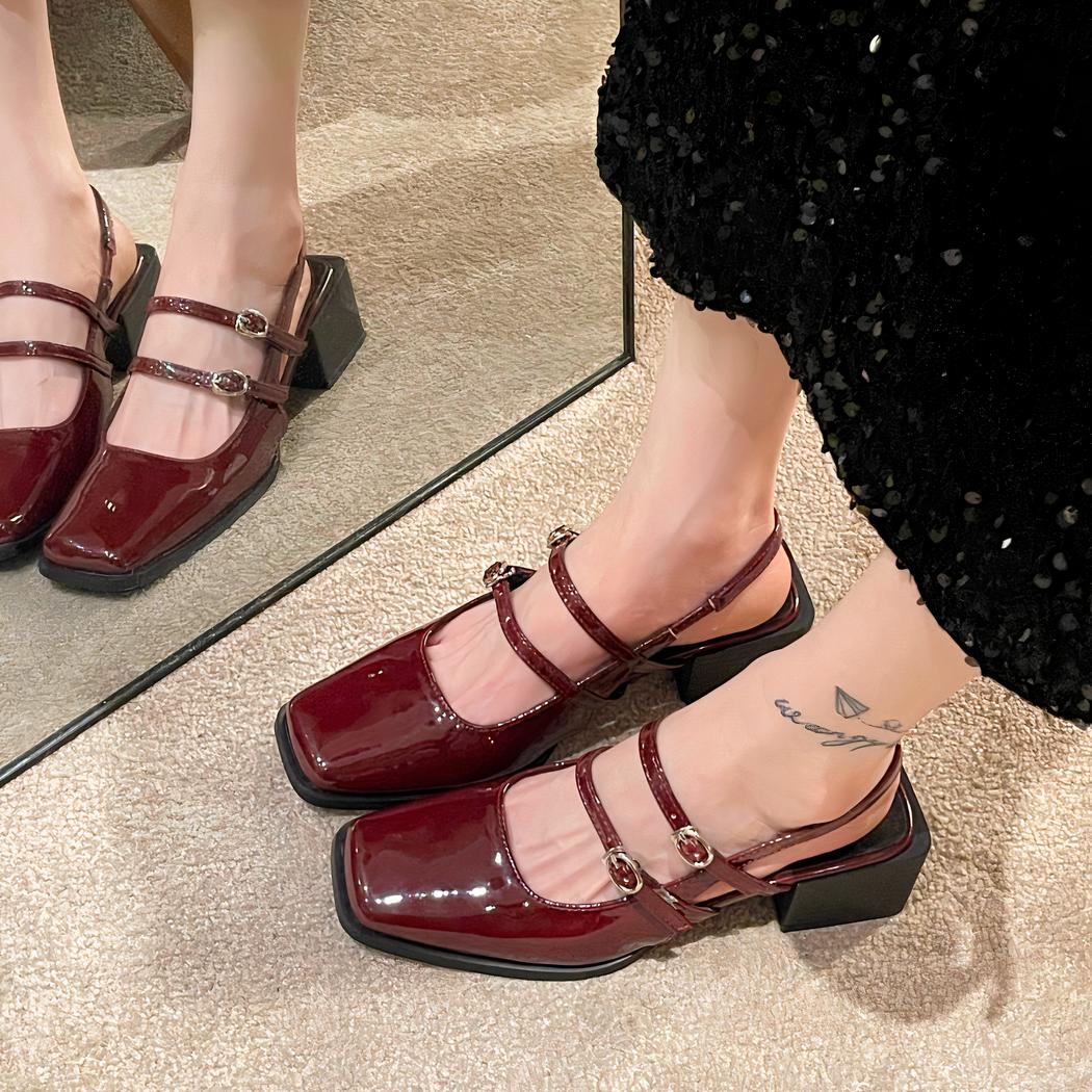 Patent ballerina loafers with buckles and low heels