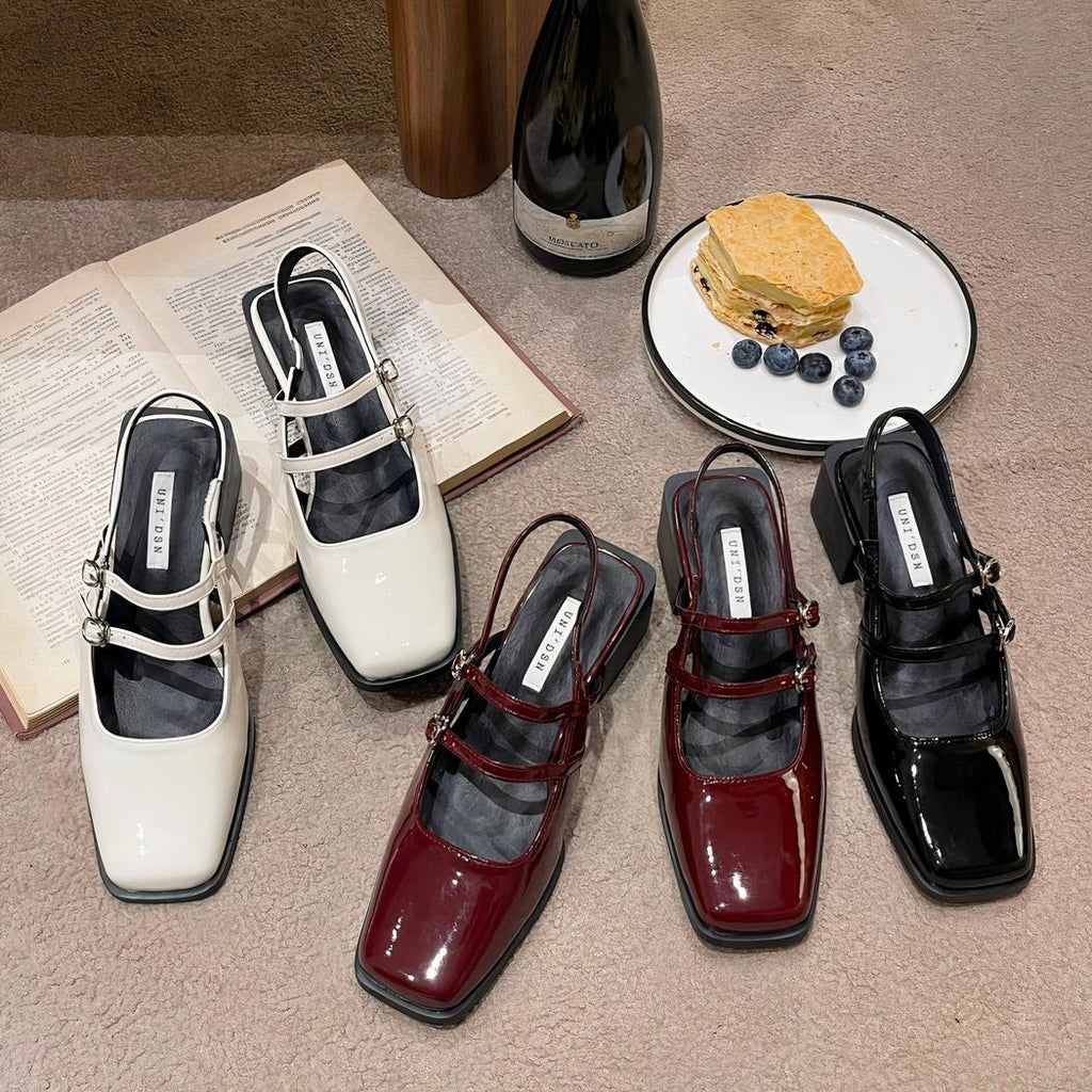 Patent ballerina loafers with buckles and low heels