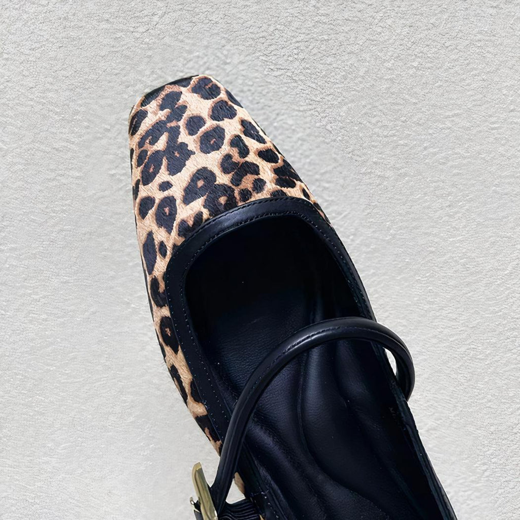 Leopard print ballet flat loafer with a gold buckle