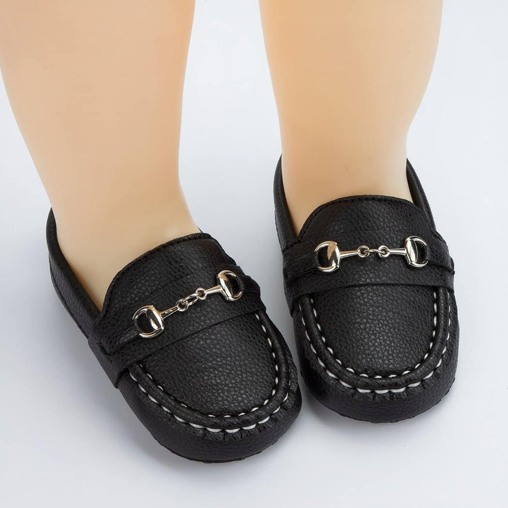 Baby moccasins in grained leather with silver bits