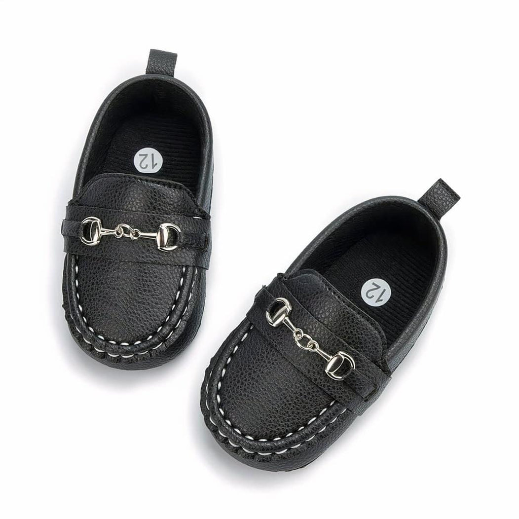 Baby moccasins in grained leather with silver bits