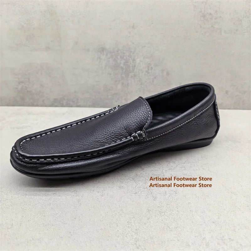 Men's black slip-on loafers with white stitching, view 7