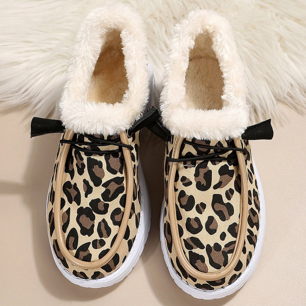 Faux fur boat moccasins with leopard print