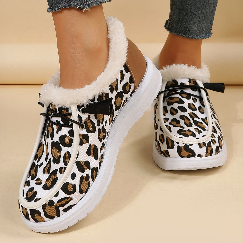 Faux fur boat moccasins with leopard print