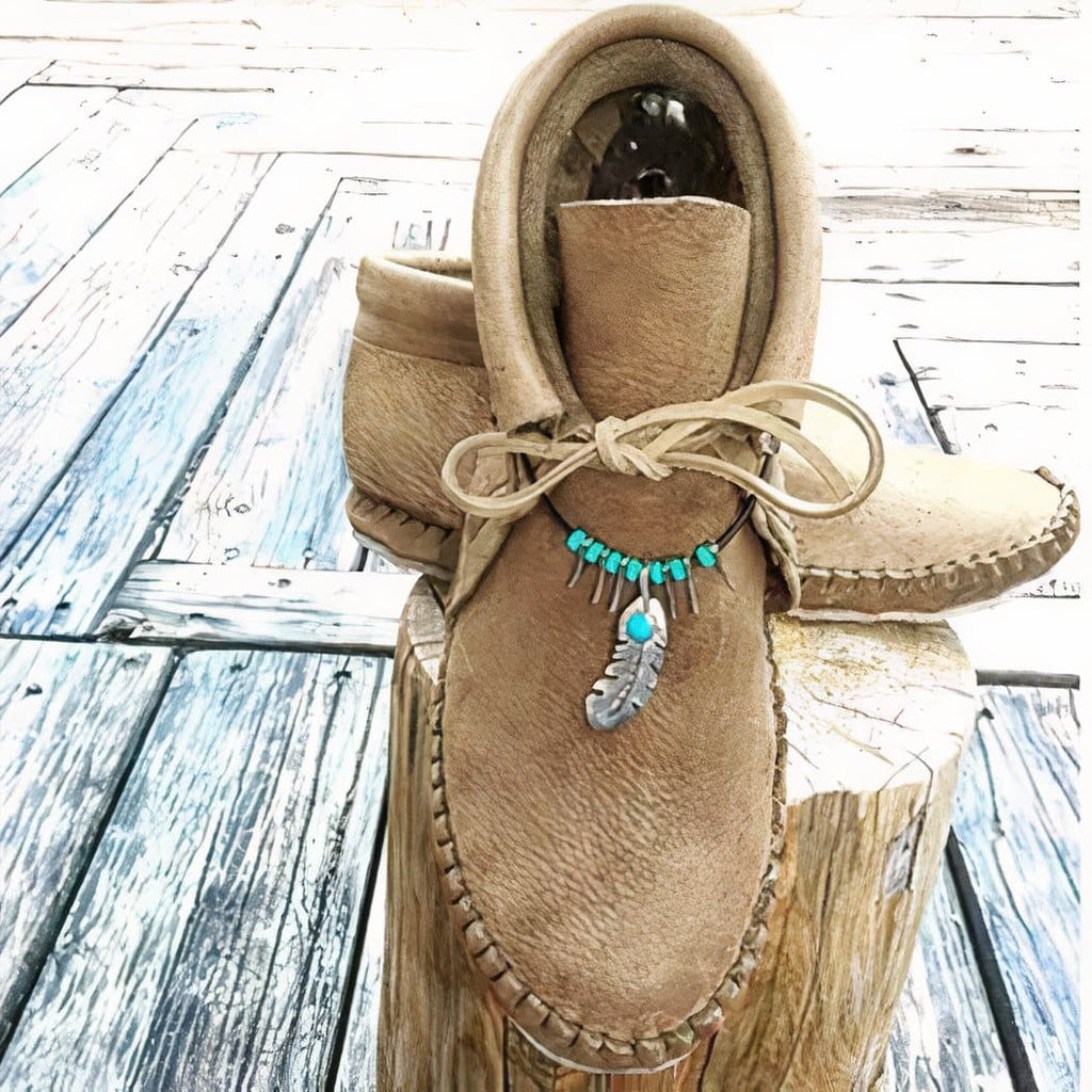 Indian faux leather moccasins with a jewel