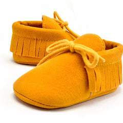 Lace-up baby moccasins with bangs, Yellow