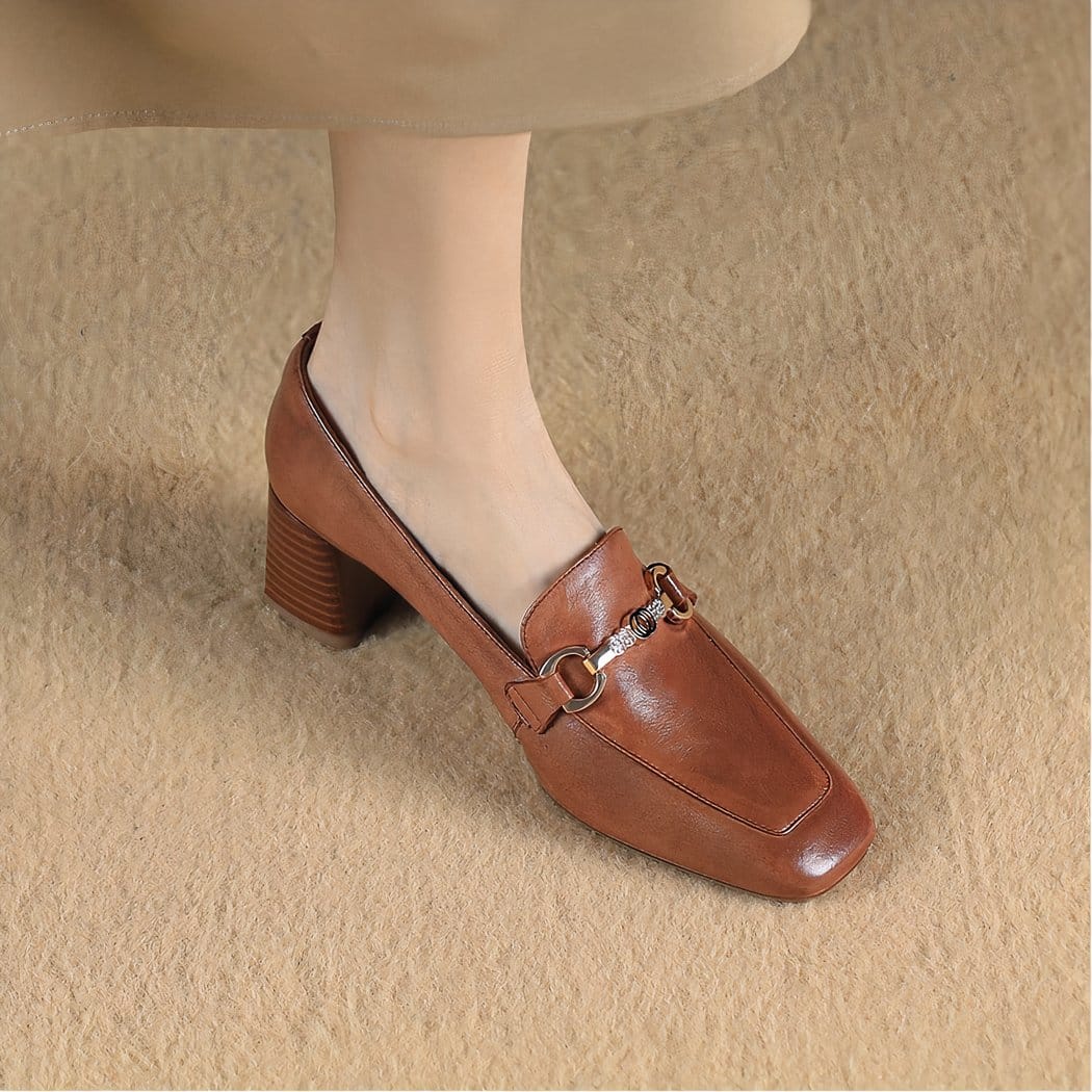 Leather loafers with heels and bits