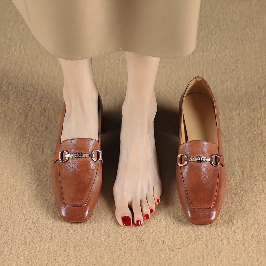 Leather loafers with heels and bits