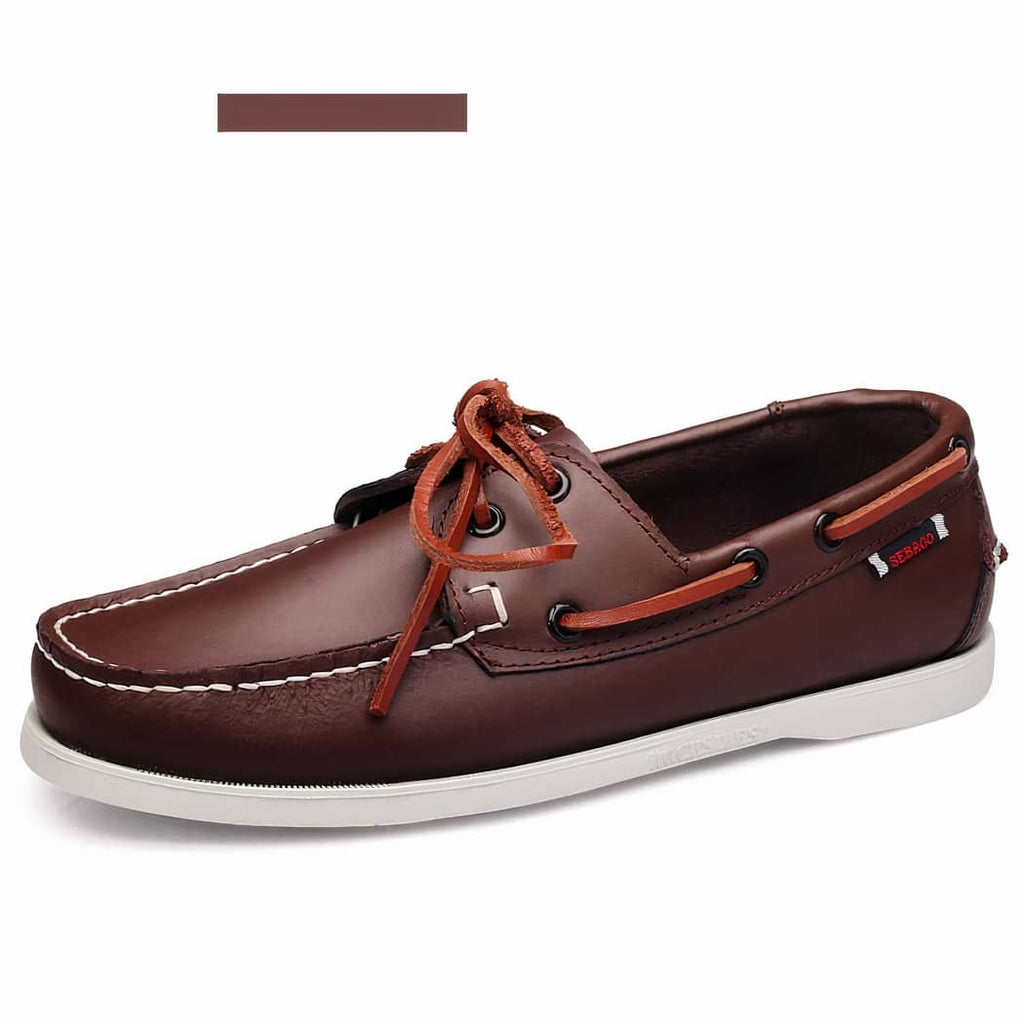 Brown boat loafer on white background.