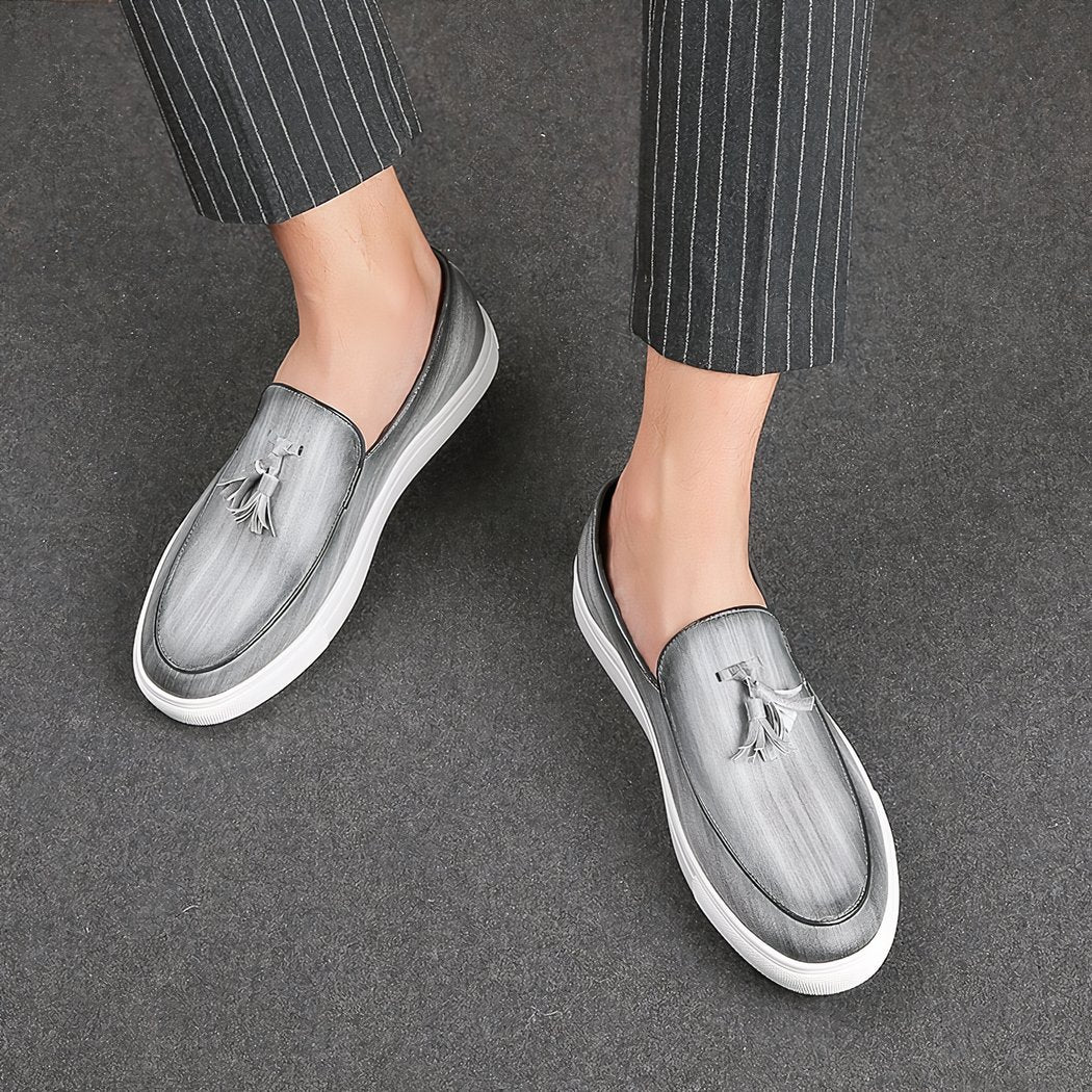 Men's synthetic leather tassel loafers with white soles