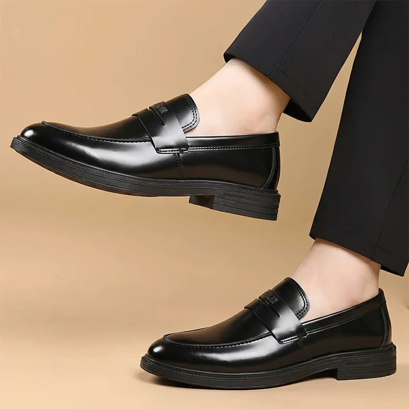 Men's black business loafers with thick sole, back view