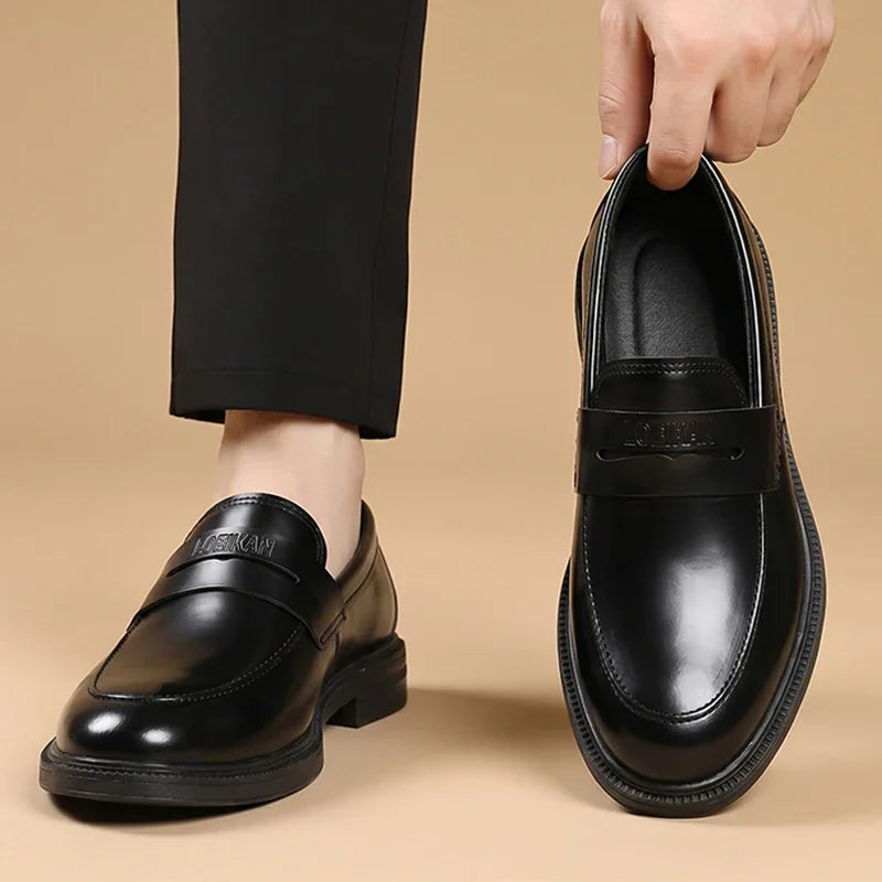 Men's black business loafers with thick sole, worn view